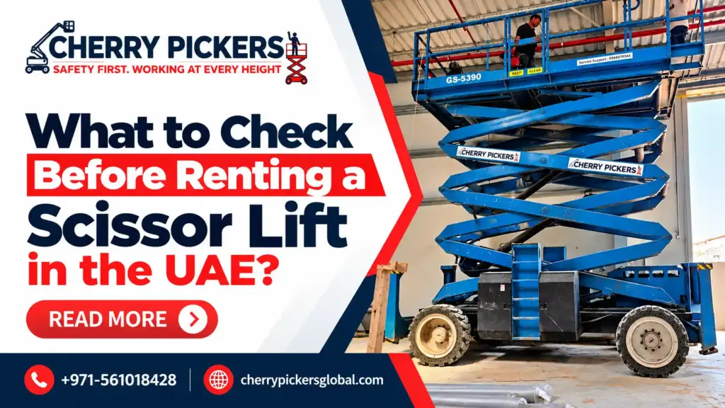 Blue scissor lift raised for maintenance work inside an industrial warehouse in the UAE